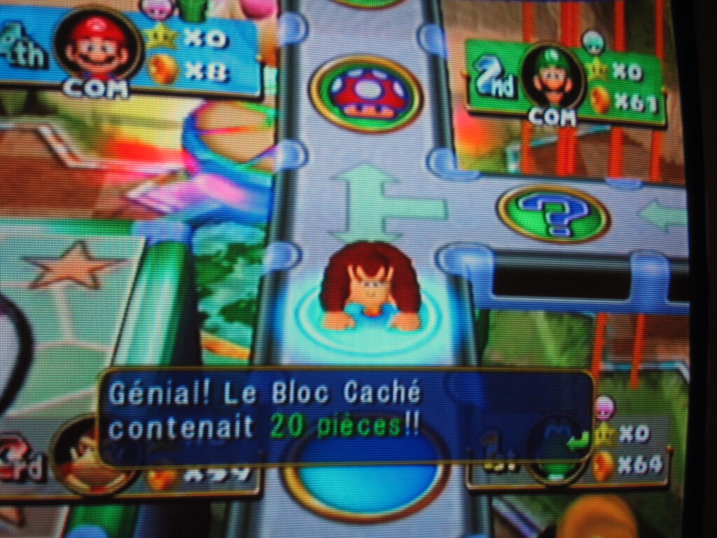 Une petite partie de Mario Party avec Christopher sur la Game Cube -- 2004